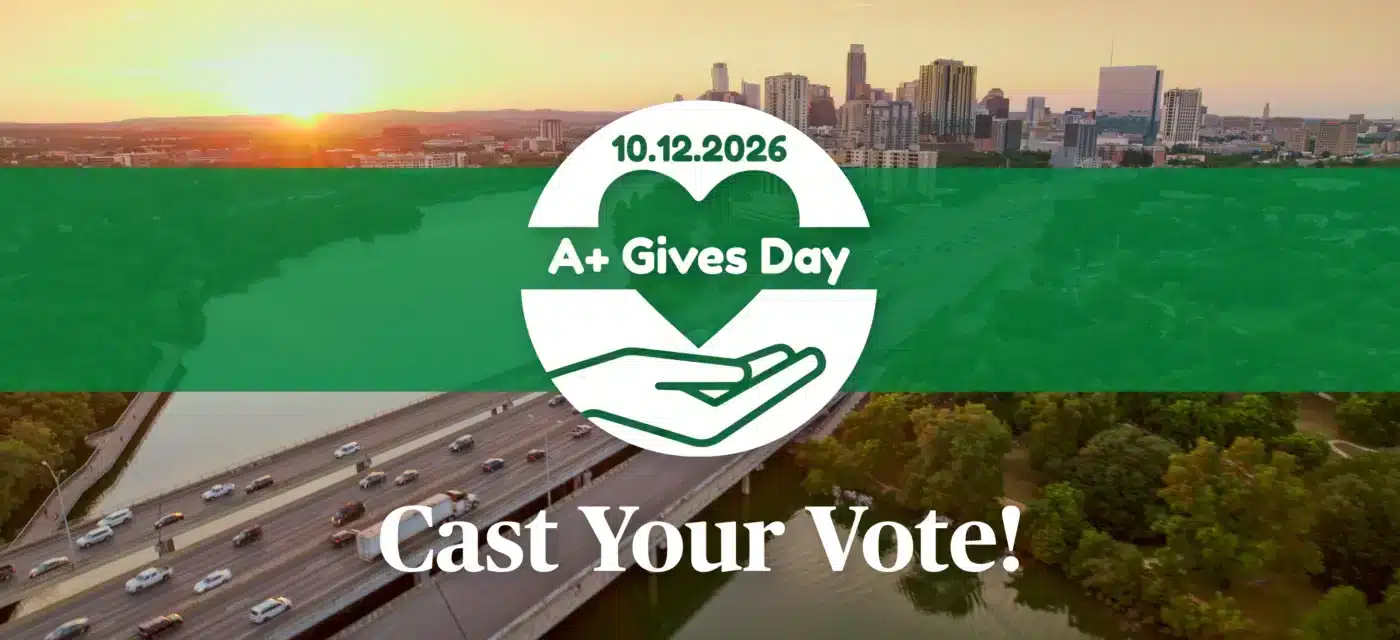 Banner for A+ Gives Day with city skyline at sunset, green overlay, and 'Cast Your Vote!' prompt, encouraging participation.