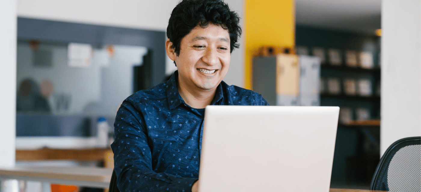 Male sitting in front of a laptop