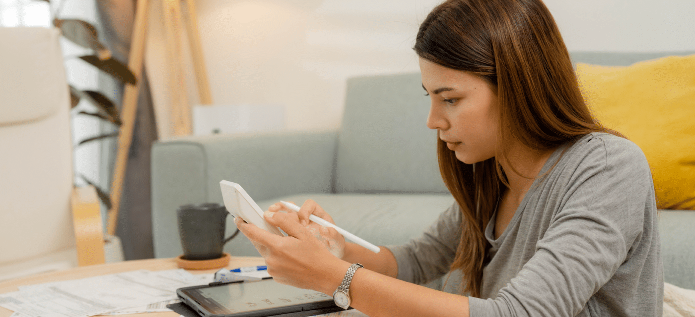 Woman working on her phone.