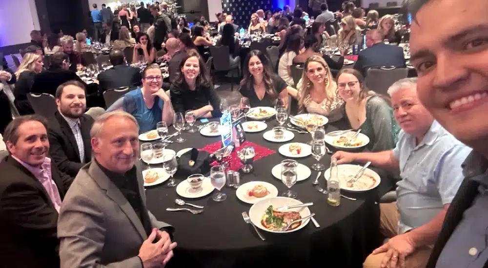 Team A+ celebrates together at the Austin Community's Choice Awards Gala.