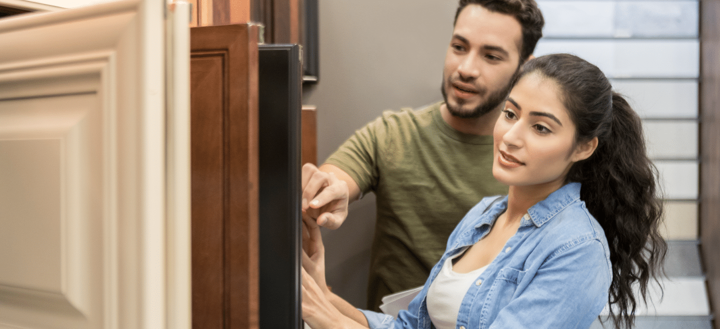 Couple looking at new cabinets