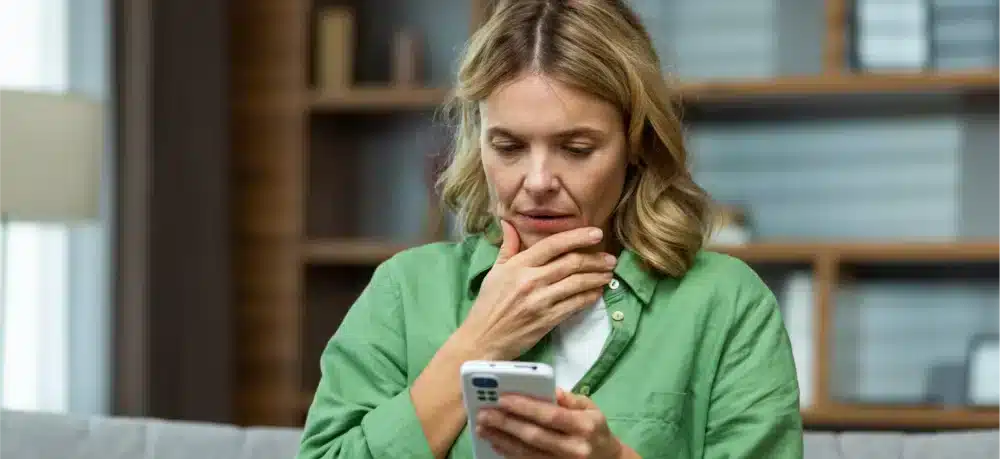 Woman looking at her cell phone