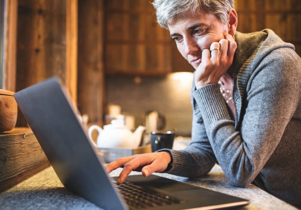 a woman using a laptop